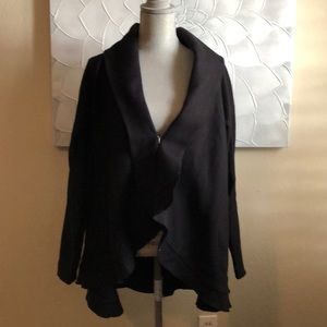 Great black jacket with ruffle detail